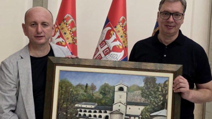 “u-ime-grupe-srba-sa-cetinja”-knezevic-poklonio-vucicu-sliku-na-kojoj-je-cetinjski-manastir-(foto)