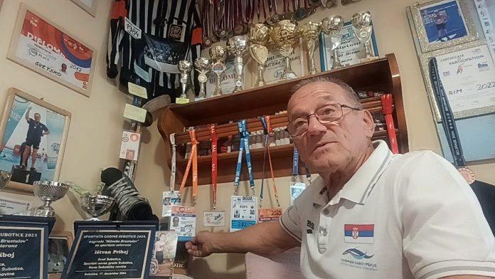 “obezbedenje-je-stajalo-oko-bazena-sa-puskama,-a-ja-sam-drzao-gadafija-za-ruke-i-ucio-ga-da-pliva”:-profa-sada-ima-84-godine-i-dalje-osvaja-medalje-u-najtezim-plivackim-kategorijama